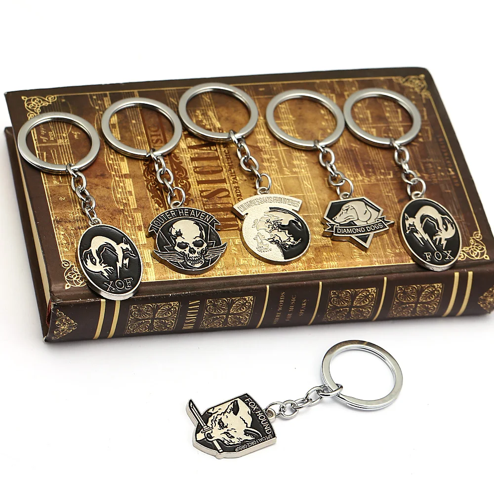 J Store Game Metal gear solid 5 Keychains Fox hound /outer heaven llaveros metal key chain skull animal game souvenir jewelry
J Store Game Metal gear solid 5 Keychains Fox hound /outer heaven llaveros metal key chain skull animal game souvenir jewelry