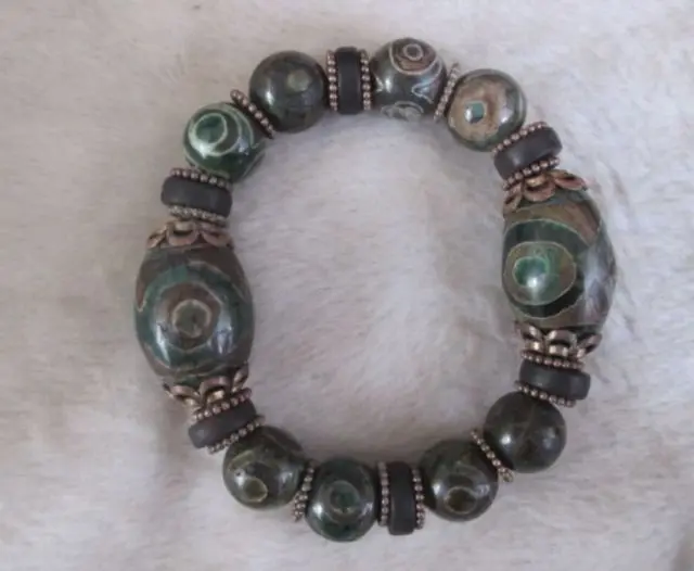 Elaborate China Tibetan king kong eye floer dzi amulet agate bracelet can scale No.5
Elaborate China Tibetan king kong eye floer dzi amulet agate bracelet can scale No.5