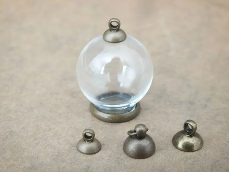 Free ship!! 10pcs/20x12mm Clear glass globe ball with different shapes bronze cap,DIY glass vial jewelry pendant
Free ship!! 10pcs/20x12mm Clear glass globe ball with different shapes bronze cap,DIY glass vial jewelry pendant