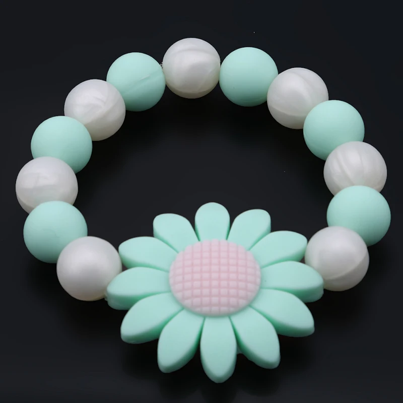 Baby Large Ring Silicone Bracelet Flower Round Teething Food Grade Large Ring Silicone Teether Pendant Baby Care Toys
Baby Large Ring Silicone Bracelet Flower Round Teething Food Grade Large Ring Silicone Teether Pendant Baby Care Toys