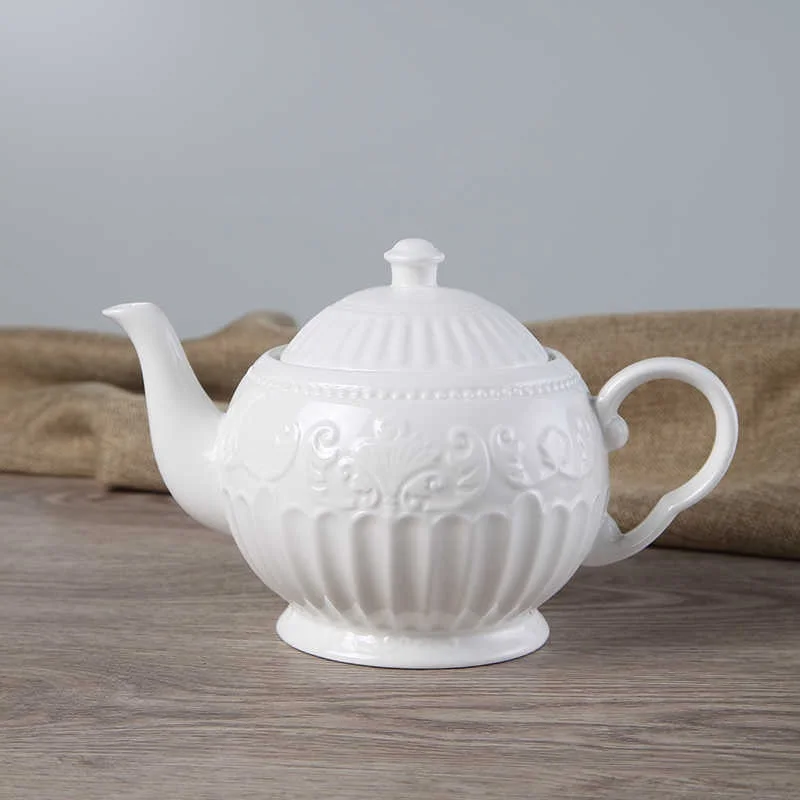 880ml European lace creative pure white kettle relief pottery European style teapot coffee pot kettle flower tea pot
880ml European lace creative pure white kettle relief pottery European style teapot coffee pot kettle flower tea pot