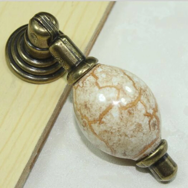 Free shipping Antique copper kitchen handles Bronze drawer knob Vintage shaky cupboard pulls Marble vein ceramic furniture knobs
Free shipping Antique copper kitchen handles Bronze drawer knob Vintage shaky cupboard pulls Marble vein ceramic furniture knobs