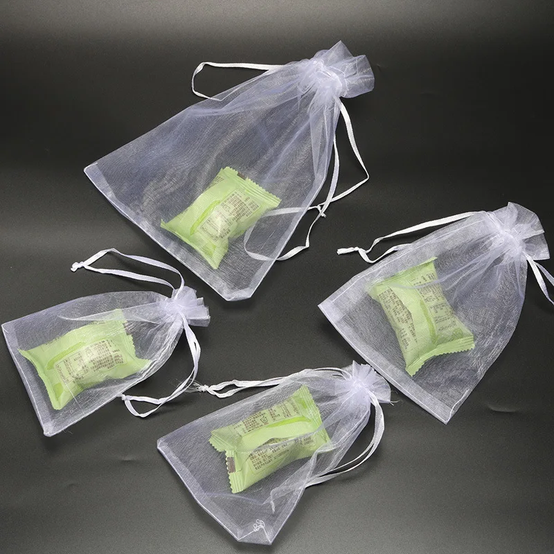 50pcs White Organza Drawstring Gift Bags Organza Drawstring Pouches Candy Dragees Sanck Favor Bags Wedding Deco Mariage Supplies
50pcs White Organza Drawstring Gift Bags Organza Drawstring Pouches Candy Dragees Sanck Favor Bags Wedding Deco Mariage Supplies