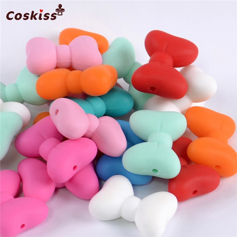 10pcs New Product Bow Tie Beads Made From Food Grade Silicone With Baby Teether Bracelet/necklace DIY Fashion Pendant
10pcs New Product Bow Tie Beads Made From Food Grade Silicone With Baby Teether Bracelet/necklace DIY Fashion Pendant