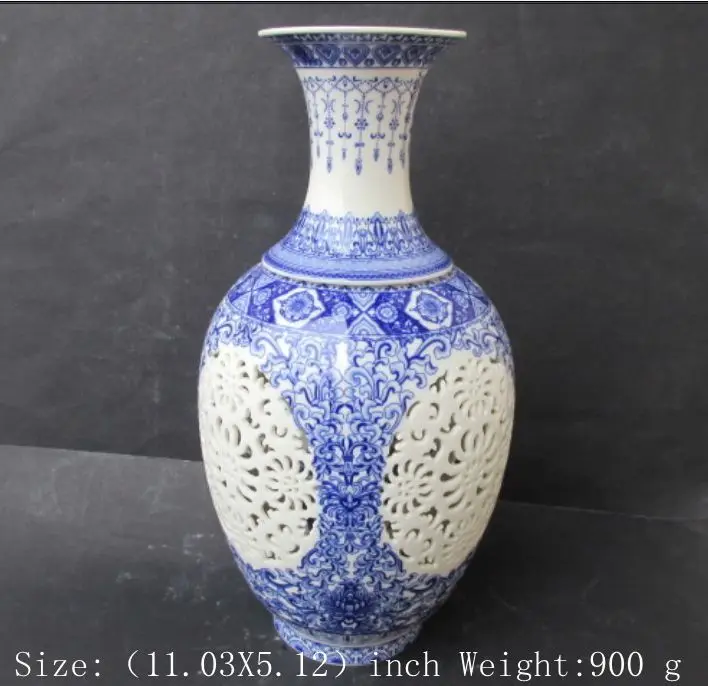 Exquisite Chinese Classical Antique hollow-out porcelain vase painted with two birds and flowers
Exquisite Chinese Classical Antique hollow-out porcelain vase painted with two birds and flowers