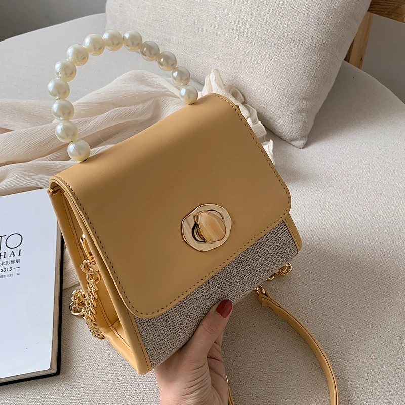Elegant Female Pearl Tote bag 2019 Summer New Quality Leather Women's Designer Handbag Chain Shoulder Messenger bag Travel bag
Elegant Female Pearl Tote bag 2019 Summer New Quality Leather Women's Designer Handbag Chain Shoulder Messenger bag Travel bag