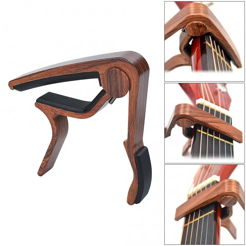 Lightweight Portable Guitar Capo Wood Grain Metal Guitar Capo with Perfect Silicon Cushion for Guitar Ukulele Tuning
Lightweight Portable Guitar Capo Wood Grain Metal Guitar Capo with Perfect Silicon Cushion for Guitar Ukulele Tuning
