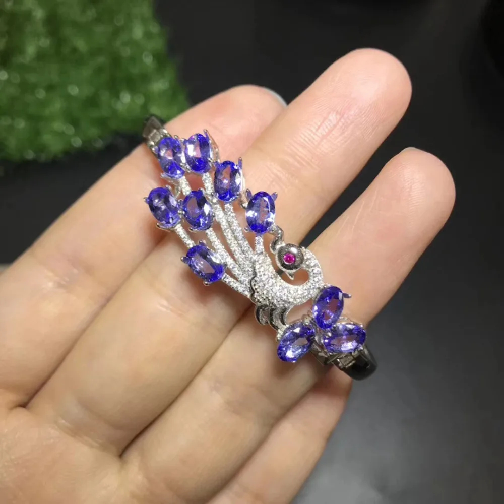 Elegant Natural blue tanzanite Peacock Wing Bangles Natural gemstone Bangles S925 silver bracelet women girl party fine jewelry
Elegant Natural blue tanzanite Peacock Wing Bangles Natural gemstone Bangles S925 silver bracelet women girl party fine jewelry