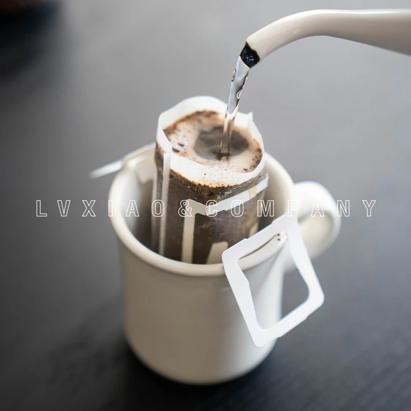50Pcs/Pack Disposable Coffee Fliter Bags Portable Hanging Ear Style Coffee Filters Eco-Friendly Paper Bag For Espresso Coffee
50Pcs/Pack Disposable Coffee Fliter Bags Portable Hanging Ear Style Coffee Filters Eco-Friendly Paper Bag For Espresso Coffee