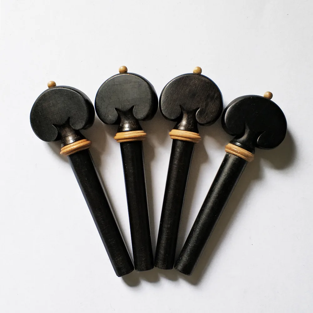 4/4 Violin Pegs Heart Model Ebony Wood with Boxwood Collar Dot Natural Black Color
4/4 Violin Pegs Heart Model Ebony Wood with Boxwood Collar Dot Natural Black Color