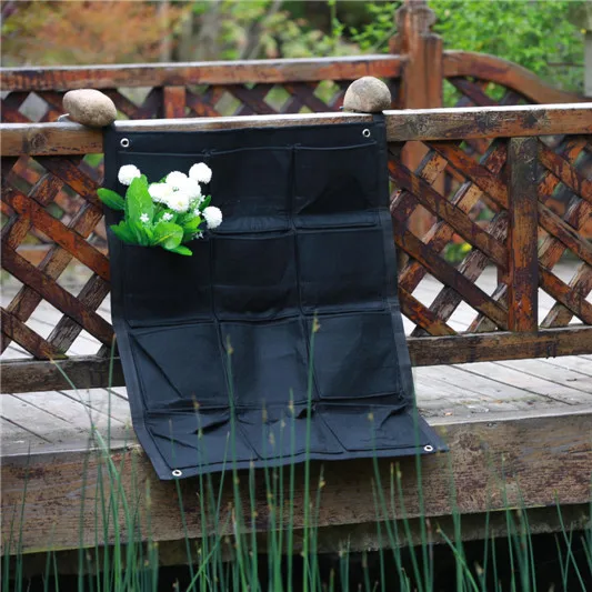 12 pockets Felt Outdoor Vertical Gardening Flower Pots and Planter, Hanging Pots Planter On wall Field with plastic on the back
12 pockets Felt Outdoor Vertical Gardening Flower Pots and Planter, Hanging Pots Planter On wall Field with plastic on the back