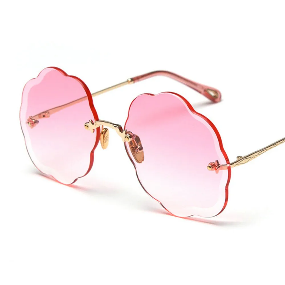 Фото Женские солнцезащитные очки NX розовые металлические без оправы