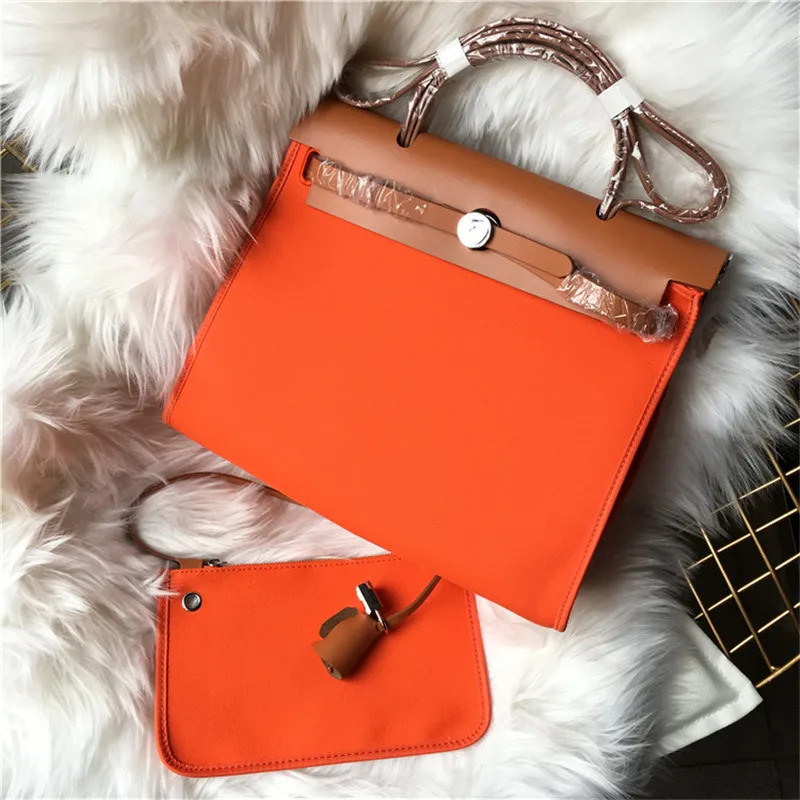 luxury designer Genuine Leather handbag women canvas tote Bag brand ladies hand bags Female shoulder Bag bolso mujer purse borse
luxury designer Genuine Leather handbag women canvas tote Bag brand ladies hand bags Female shoulder Bag bolso mujer purse borse