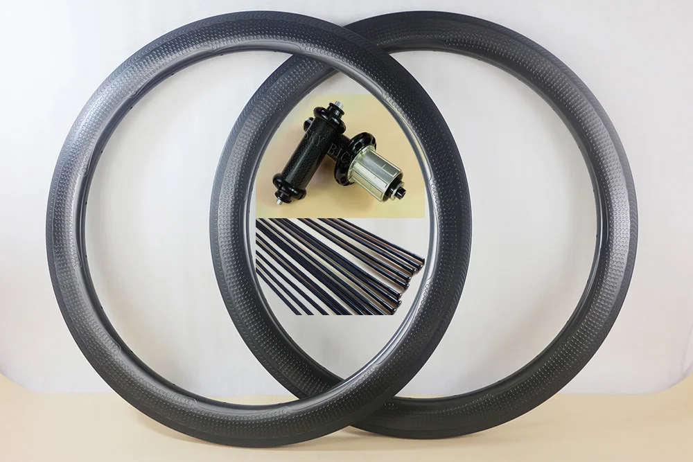 New carbon clincher dimpled surface 58mm depth 26mm width road bike carbon wheels 20/24h R36 straight pull hub 1423 aero spokes
New carbon clincher dimpled surface 58mm depth 26mm width road bike carbon wheels 20/24h R36 straight pull hub 1423 aero spokes