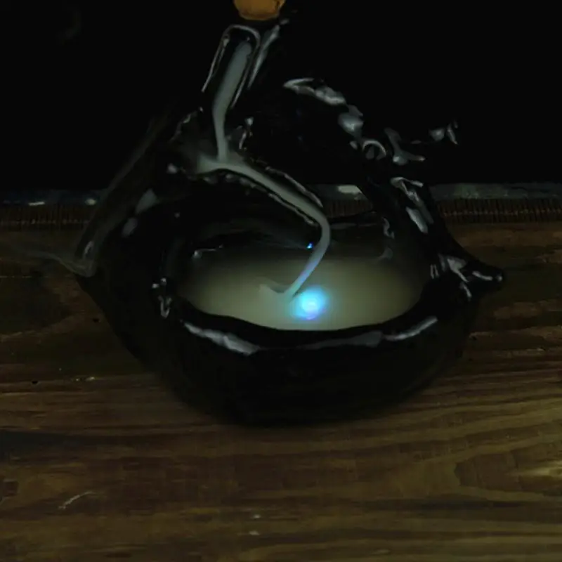 Creative Led Incense Burner Ceramic Furnace Ornament Sandalwood Cones Smoking Backflow Censer Black Porcelain Home Decoration
Creative Led Incense Burner Ceramic Furnace Ornament Sandalwood Cones Smoking Backflow Censer Black Porcelain Home Decoration