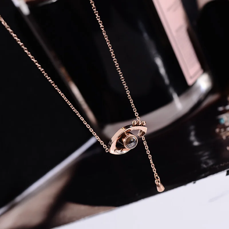 YUN RUO Rose Gold 100 languages I love you Projection Necklace Eyes Pendant Titanium Steel Jewelry Woman Birthday Gift Not Fade
YUN RUO Rose Gold 100 languages I love you Projection Necklace Eyes Pendant Titanium Steel Jewelry Woman Birthday Gift Not Fade