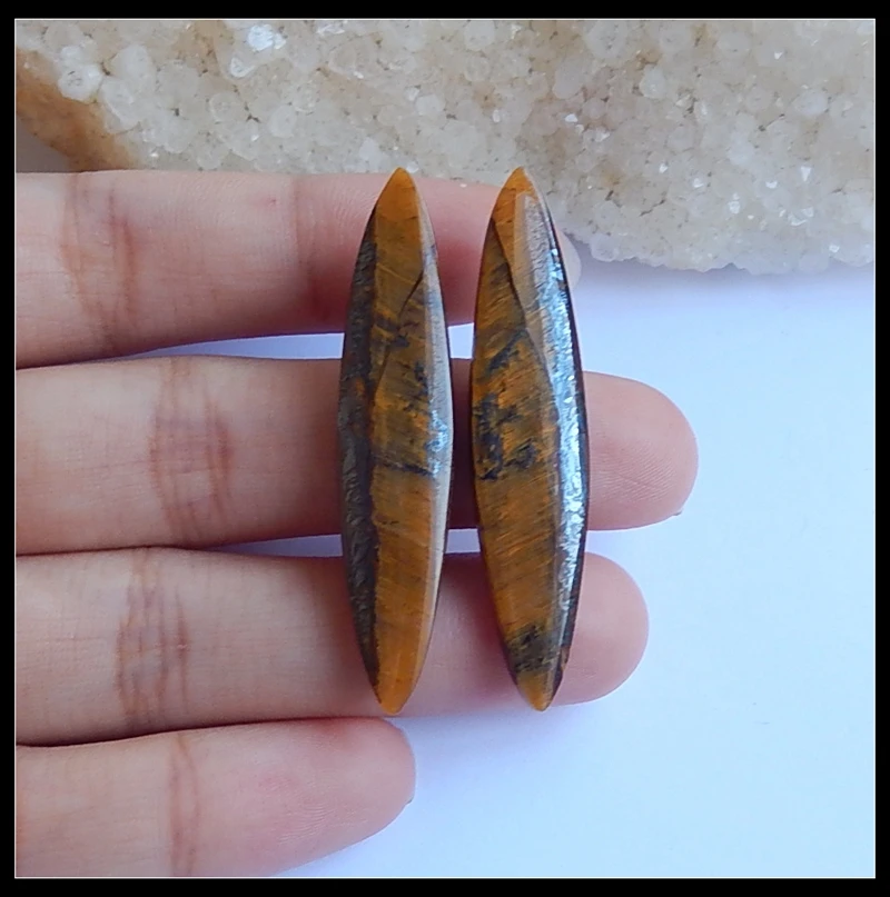 Wholesales Natural Stone Tiger'Eye Gemstone Handmade Earring Bead 46x10x4mm 6.64g Fashion Jewelry Women Earrings Accessorise
Wholesales Natural Stone Tiger'Eye Gemstone Handmade Earring Bead 46x10x4mm 6.64g Fashion Jewelry Women Earrings Accessorise