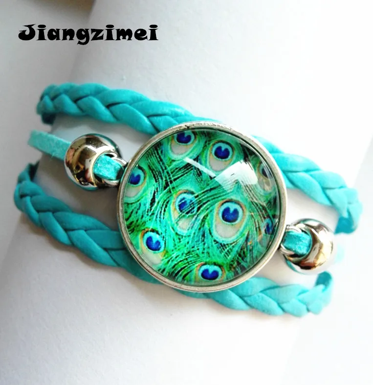 1pc Jiangzimei Peacock feathers leather bracelet Cartoon silver bracelets Glass Round Dome bracelet
1pc Jiangzimei Peacock feathers leather bracelet Cartoon silver bracelets Glass Round Dome bracelet