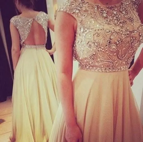 Gorgeous A Line Prom Dresses 2017 Cap Sleeve Bateau Crystal Beaded Open Back Floor-Length Chiffon Evening Dress Vestidos XY566
Gorgeous A Line Prom Dresses 2017 Cap Sleeve Bateau Crystal Beaded Open Back Floor-Length Chiffon Evening Dress Vestidos XY566