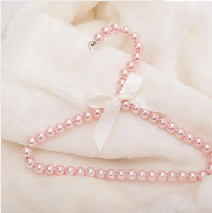 7pcs Fashion Plastic Pearl Bow Clothes Clothing Hanger For Kids Children Pet Dog Cat
7pcs Fashion Plastic Pearl Bow Clothes Clothing Hanger For Kids Children Pet Dog Cat