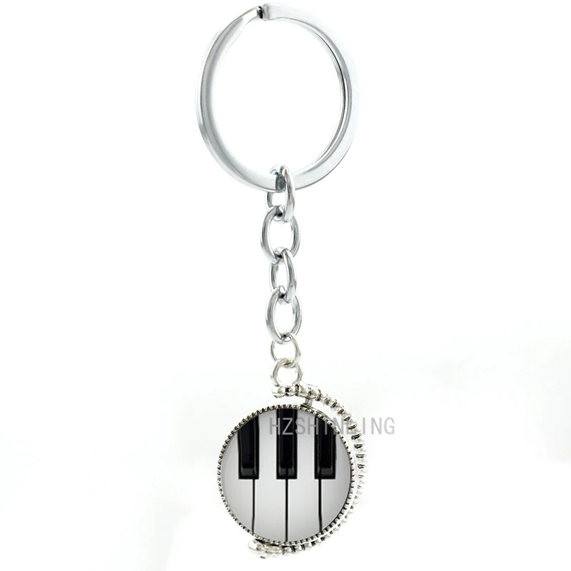 Double side rotatable Pianoforte keychain vintage black and white Piano Keyboard music women Musician key chain ring holder T486
Double side rotatable Pianoforte keychain vintage black and white Piano Keyboard music women Musician key chain ring holder T486