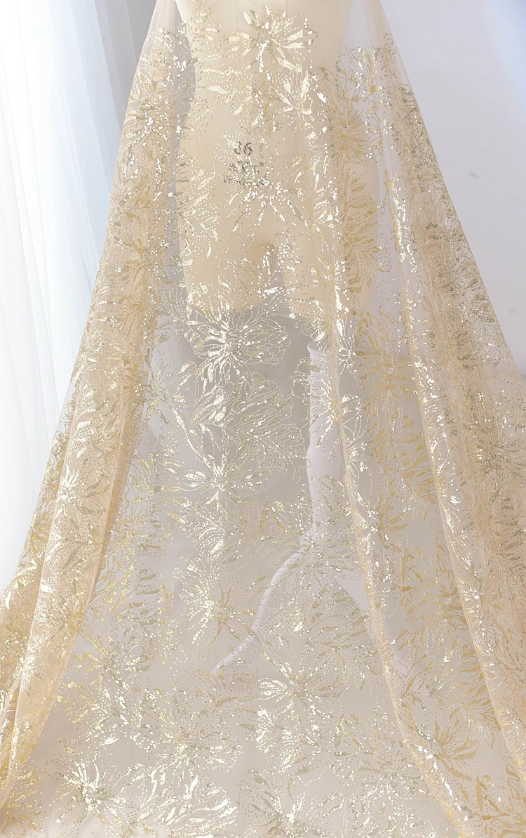 Navy blue gold sequins embroidered lace fabric Peony court fashion clothing fabric high-end wedding dress fabric
Navy blue gold sequins embroidered lace fabric Peony court fashion clothing fabric high-end wedding dress fabric