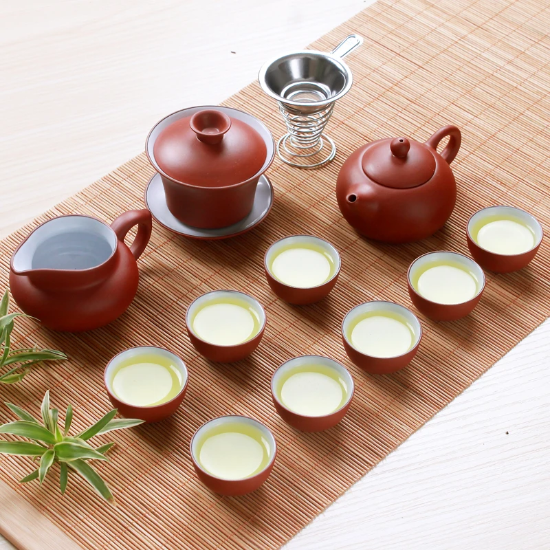 Authentic Yixing Purple Sand Tea Set 13 Pieces Handmade Zisha Teapot Set Infuser Kung Fu Tea Set
Authentic Yixing Purple Sand Tea Set 13 Pieces Handmade Zisha Teapot Set Infuser Kung Fu Tea Set