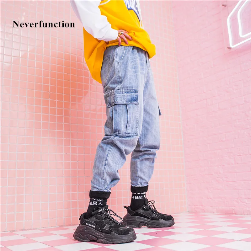 Neverfunction Men Fashion Multi-pocket Loose Jeans High quality solid Mens Streetwear Hip hop Denim Patterns Pencil Trousers
Neverfunction Men Fashion Multi-pocket Loose Jeans High quality solid Mens Streetwear Hip hop Denim Patterns Pencil Trousers