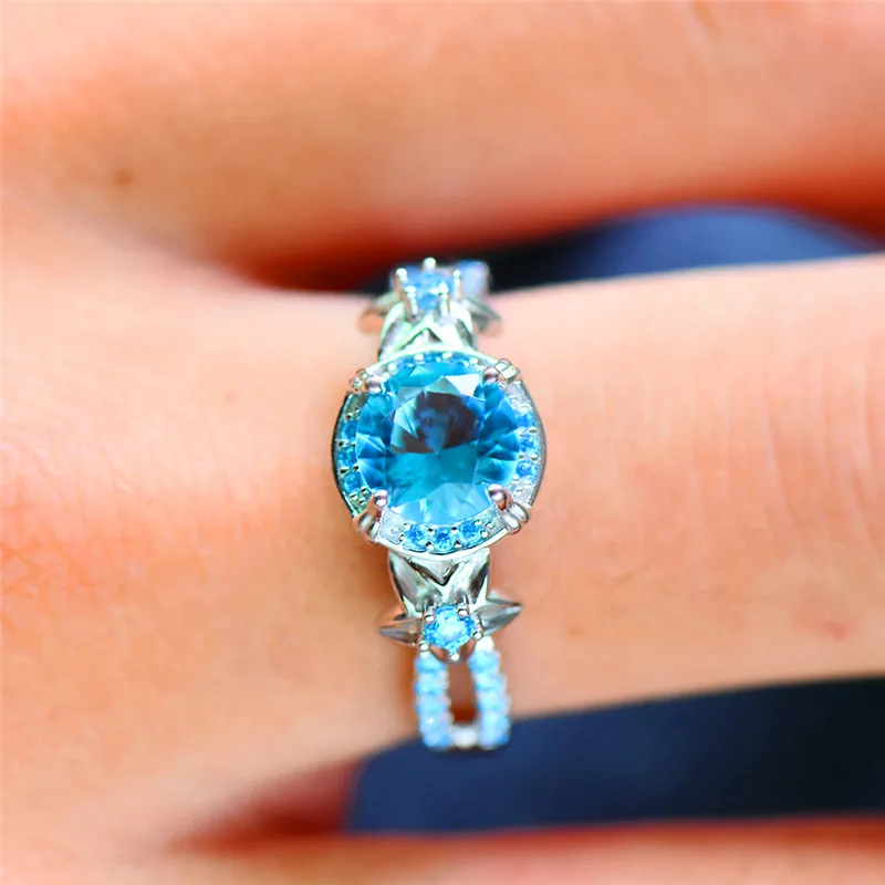 Luxury Female Blue Topaz Flower Ring Cute Boho 925 Sterling Silver Ring Vintage Wedding Bands Promise Engagement Rings For Women
Luxury Female Blue Topaz Flower Ring Cute Boho 925 Sterling Silver Ring Vintage Wedding Bands Promise Engagement Rings For Women