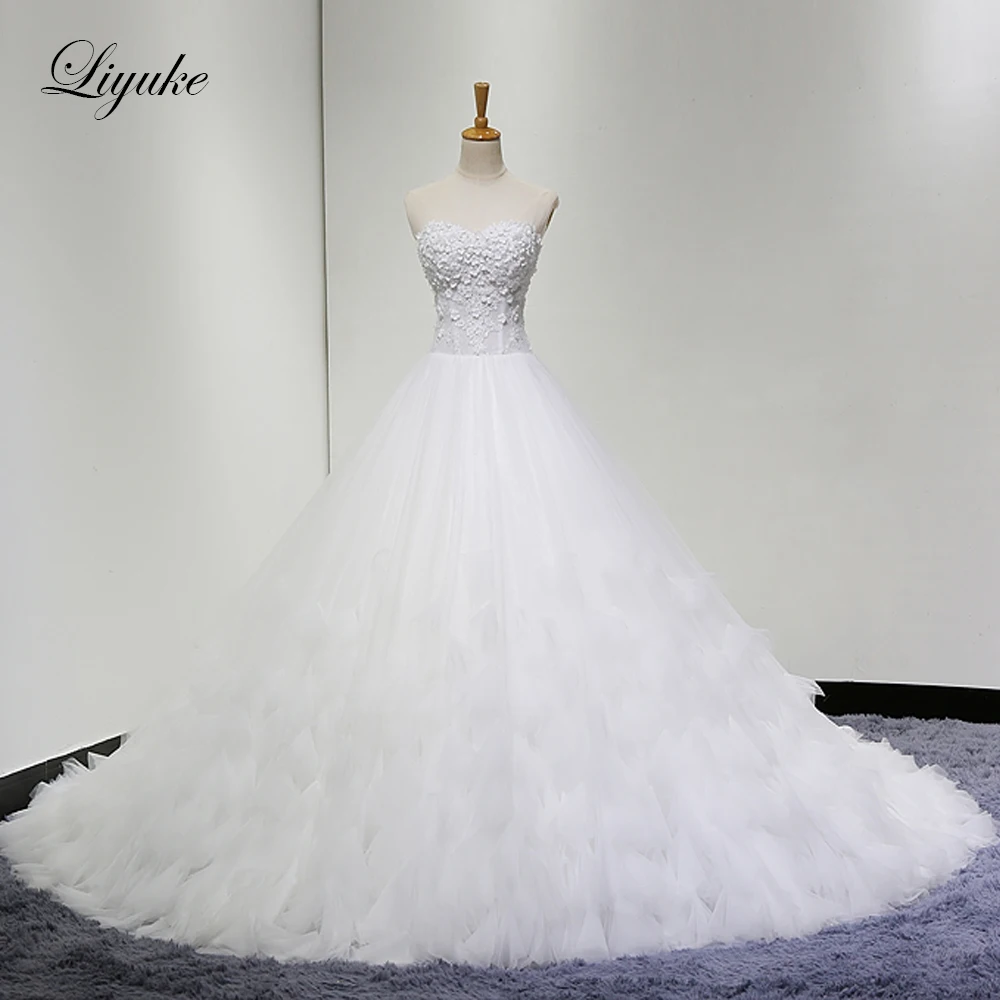 Liyuke Strapless A Line Wedding Dress Lace Up Design Custom Made 3D Flowers Bridal Dress
Liyuke Strapless A Line Wedding Dress Lace Up Design Custom Made 3D Flowers Bridal Dress
