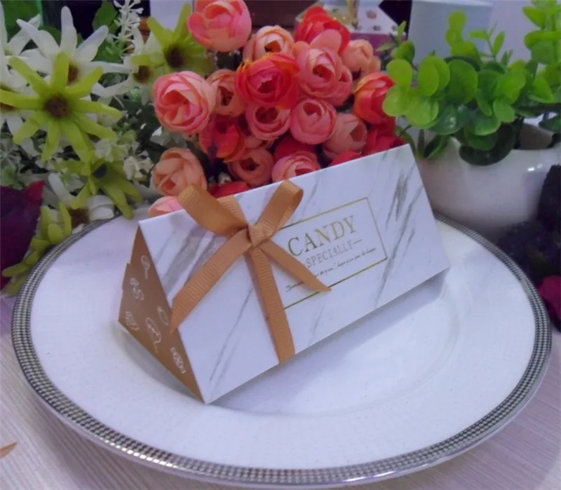 European Baby Shower Triangular Candy Box Gift Bag Birthday Party Gift Box With Ribbon Wedding Paper Box Festival Supplies
European Baby Shower Triangular Candy Box Gift Bag Birthday Party Gift Box With Ribbon Wedding Paper Box Festival Supplies