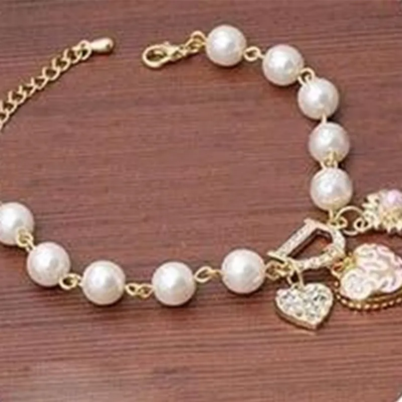 Simulation Pearl Crystal Beaded Bracelet with Heart Shaped Flowers and Infinite Fashion Women's Bracelet 2019
Simulation Pearl Crystal Beaded Bracelet with Heart Shaped Flowers and Infinite Fashion Women's Bracelet 2019