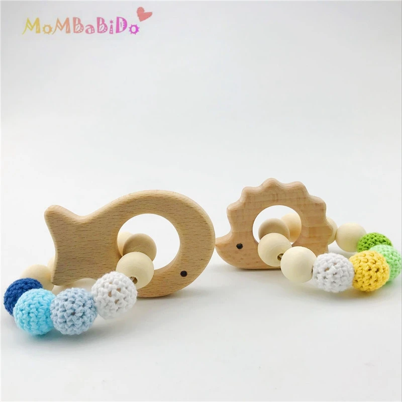 1pcs Whale / Hedgehog Shape Kids Wooden Teether Bracelet Toy Newborn Chew DIY Teething Jewelry Baby Nursing Bracelet
1pcs Whale / Hedgehog Shape Kids Wooden Teether Bracelet Toy Newborn Chew DIY Teething Jewelry Baby Nursing Bracelet