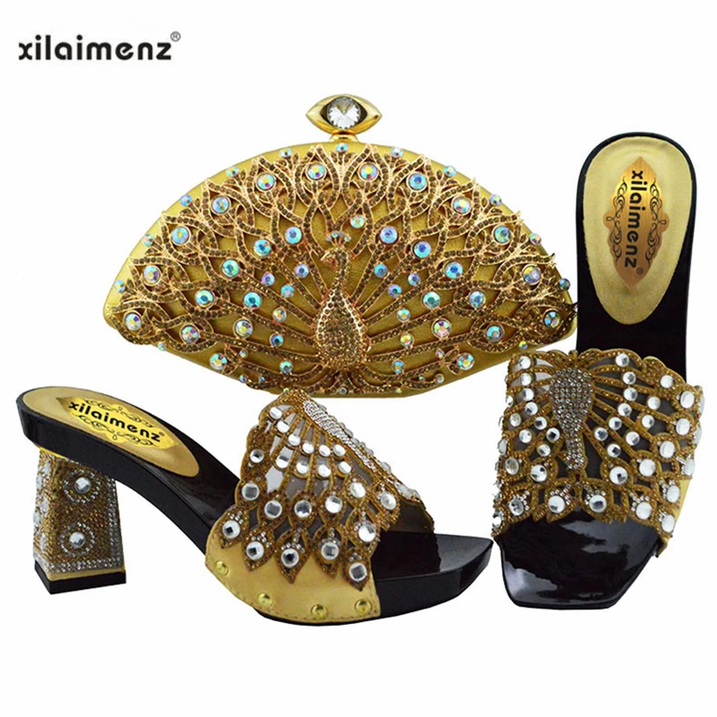 Gold Color Ladies African Shoes and Bag Set Decorated with Rhinestone Nigerian Shoes with Matching Bags High Heels Party Shoe
Gold Color Ladies African Shoes and Bag Set Decorated with Rhinestone Nigerian Shoes with Matching Bags High Heels Party Shoe