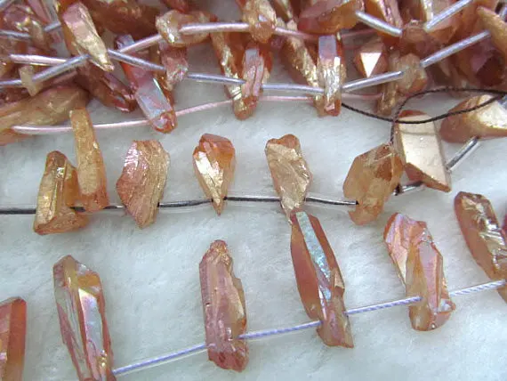 high quality 15-30mm 5strands Titanium AB quartz crystal freeform spikes points drilled briolettes jewelry peach red mixed chain
high quality 15-30mm 5strands Titanium AB quartz crystal freeform spikes points drilled briolettes jewelry peach red mixed chain