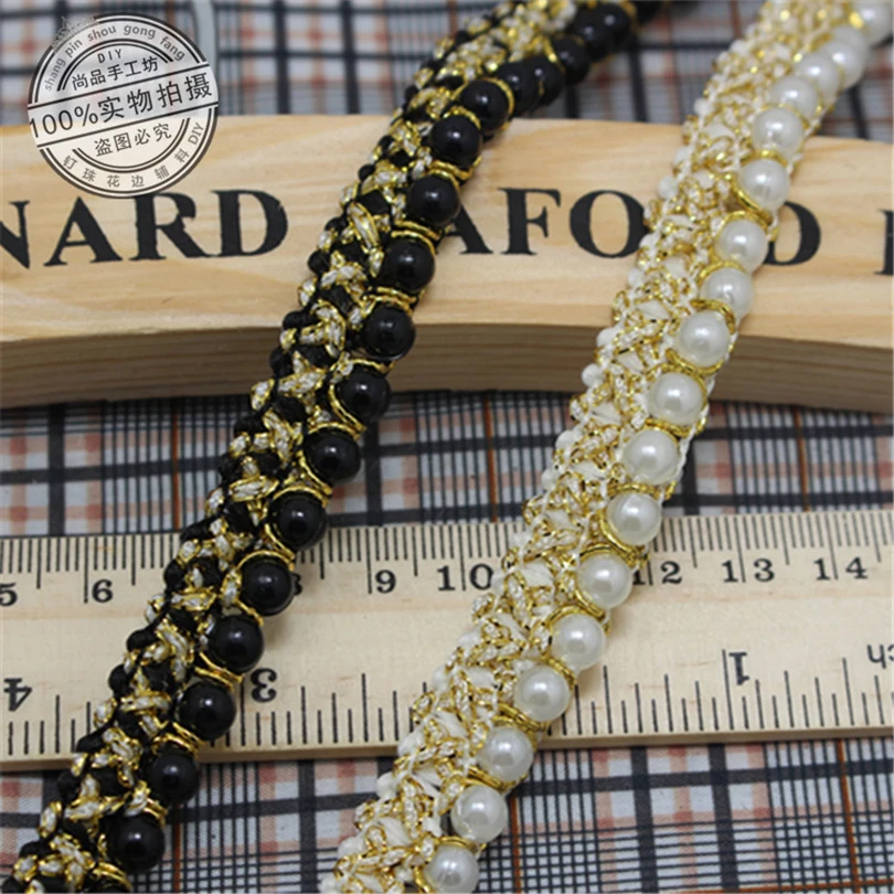 5Yards Pearl Beaded Embroidered Rhinestones Applique Golden Braided Lace Ribbon Trim For Wedding Dress 
5Yards Pearl Beaded Embroidered Rhinestones Applique Golden Braided Lace Ribbon Trim For Wedding Dress