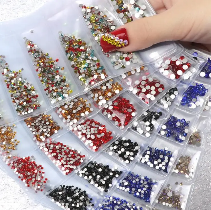 1Set 6 Sizes Nail Art Rhinestones Super Glitter 20 colors 1440Pcs Multicolor For Decoration Strass Hotfix Flat Back Rhinestones
1Set 6 Sizes Nail Art Rhinestones Super Glitter 20 colors 1440Pcs Multicolor For Decoration Strass Hotfix Flat Back Rhinestones