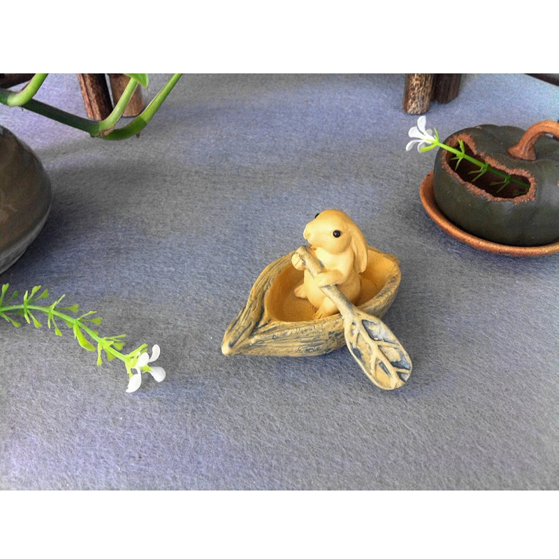 Creative Small Rabbit Rowing Tea Pet Figurines Kawaii Animal Crafts Fairy Garden Miniatures Funny Home Decoration Accessories
Creative Small Rabbit Rowing Tea Pet Figurines Kawaii Animal Crafts Fairy Garden Miniatures Funny Home Decoration Accessories