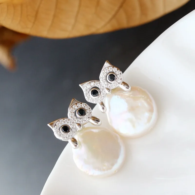 100%925silve Manually set natural baroque pearls earrings fashion 925 sterling silver earrings
100%925silve Manually set natural baroque pearls earrings fashion 925 sterling silver earrings