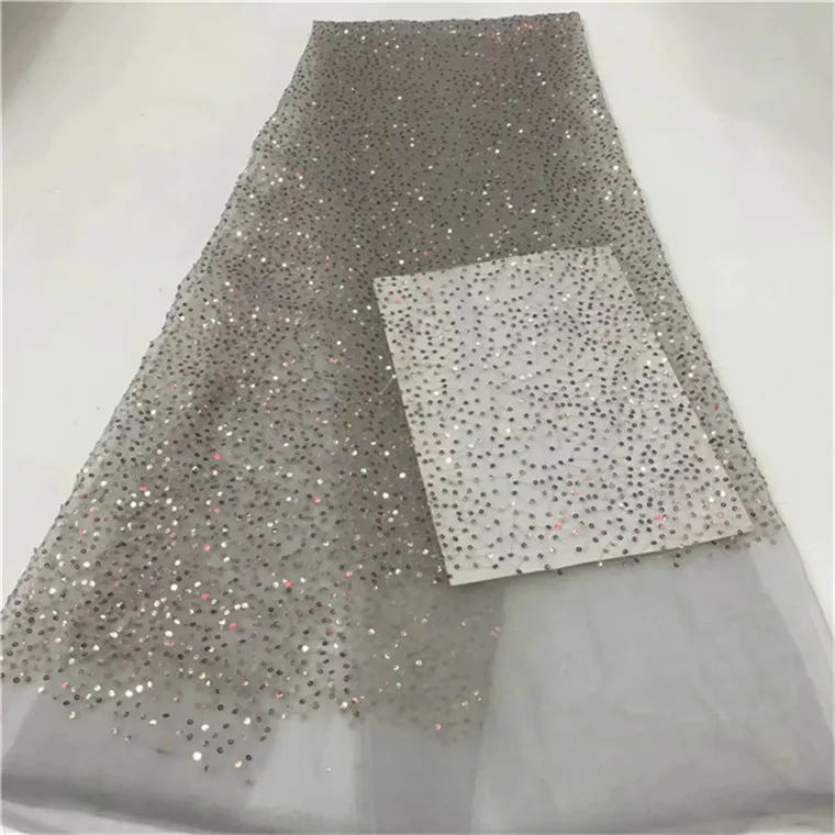 2019 high quality french tulle lace fabric African sequins net lace glitter fabric with beads silver and gold for wedding dress
2019 high quality french tulle lace fabric African sequins net lace glitter fabric with beads silver and gold for wedding dress