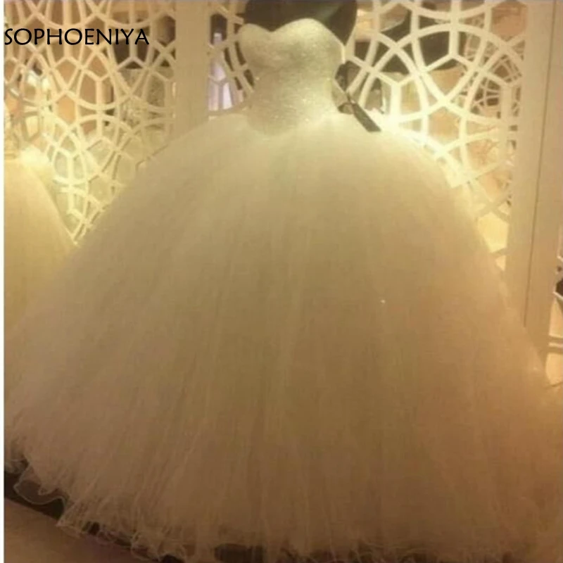 New Arrival Custom made Ball gown wedding dresses 2021 bride dress Full Hand beading Luxury wedding dress Vestido de noiva
New Arrival Custom made Ball gown wedding dresses 2021 bride dress Full Hand beading Luxury wedding dress Vestido de noiva