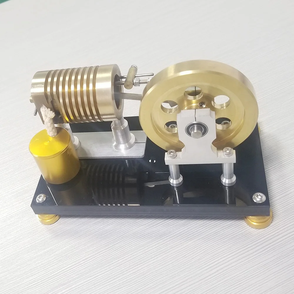Stirling engine steam engine model miniature science experiment toy birthday present.
Stirling engine steam engine model miniature science experiment toy birthday present.