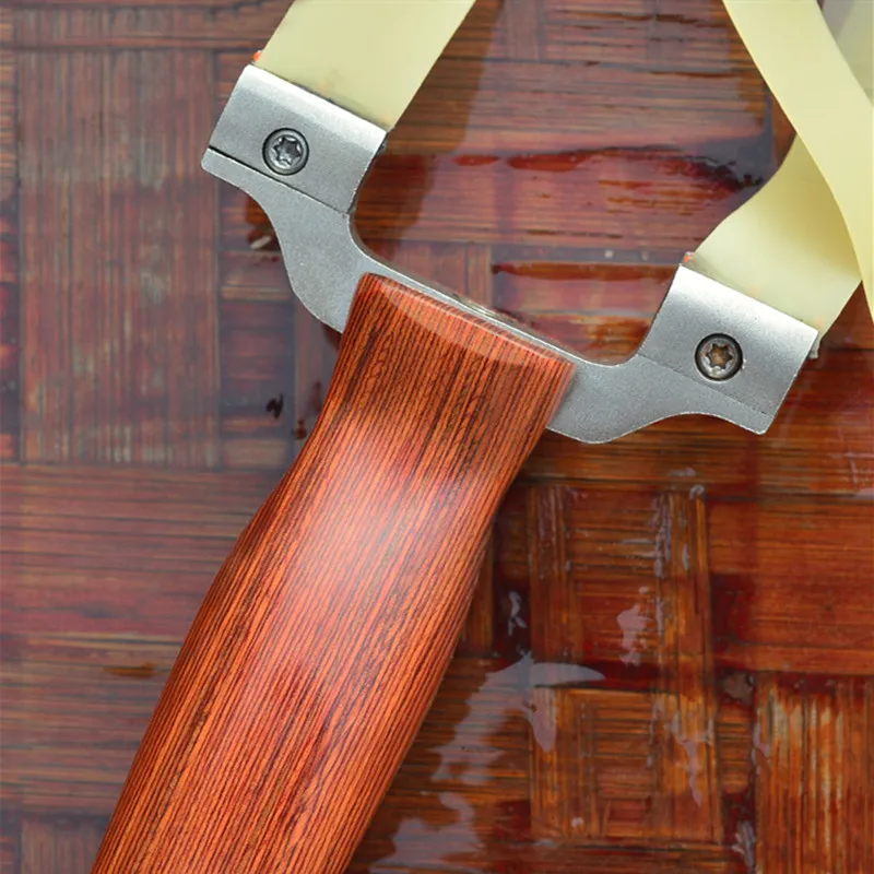 Fiber-Free Tied Flat Leather Slingshot Athletic Outdoor Stainless Steel Solid Wood Grip Hunting
Fiber-Free Tied Flat Leather Slingshot Athletic Outdoor Stainless Steel Solid Wood Grip Hunting