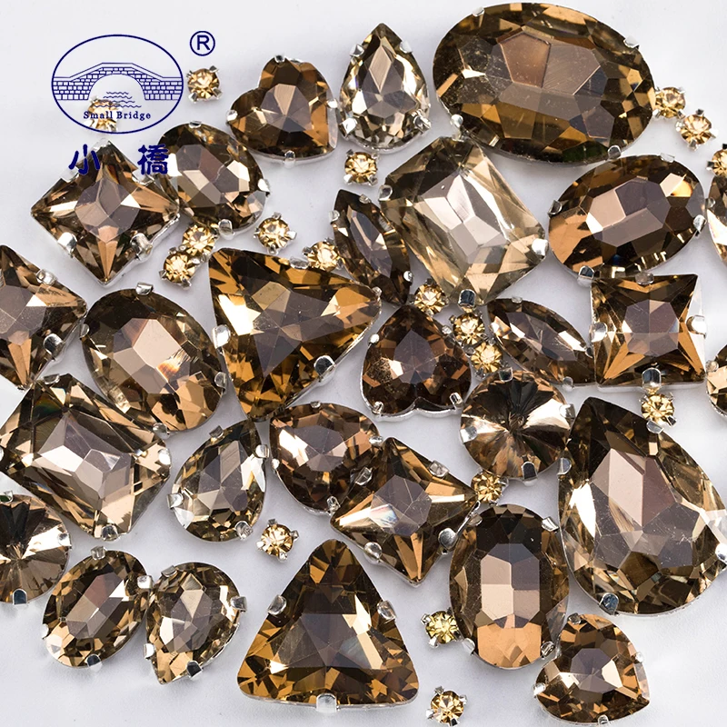 Glitter Crystal Sew On Rhinestone Light Brown Stones For Clothes Decoration Loose Glass Rhinestones With Claw 50PCS/PACK S051
Glitter Crystal Sew On Rhinestone Light Brown Stones For Clothes Decoration Loose Glass Rhinestones With Claw 50PCS/PACK S051