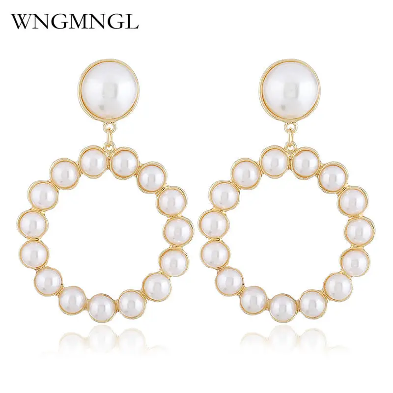 WNGMNGL 2018 New Classic Statement Simulated pearl Gold Sliver Color Hollow Round Drop Dangle Earring for Women Fashion jewelry
WNGMNGL 2018 New Classic Statement Simulated pearl Gold Sliver Color Hollow Round Drop Dangle Earring for Women Fashion jewelry