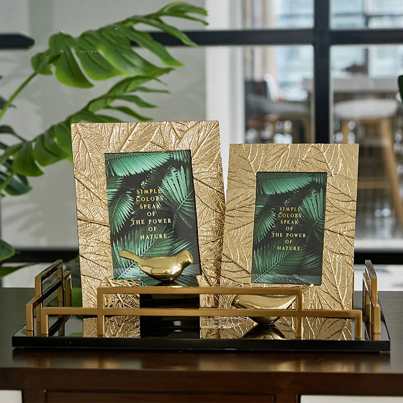 6/7 Inch Simple Golden Leaf Craft Metal Photo Frame Sample Room Side Bed Frame Photo Frame Decoration Ornaments
6/7 Inch Simple Golden Leaf Craft Metal Photo Frame Sample Room Side Bed Frame Photo Frame Decoration Ornaments