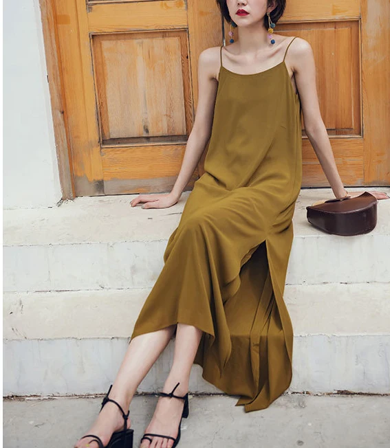 Spring and summer new style Seaside holiday dress Solid color split strap dress Open back beach dress
Spring and summer new style Seaside holiday dress Solid color split strap dress Open back beach dress