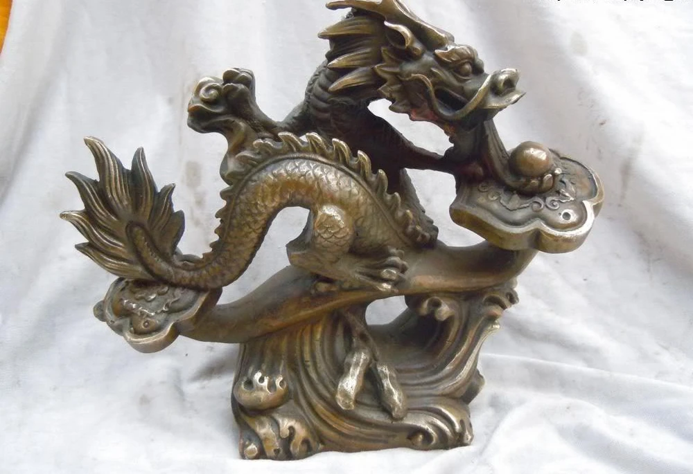 9" China brass carved fine beautiful as one wishes bead dragon sculpture statue
9" China brass carved fine beautiful as one wishes bead dragon sculpture statue