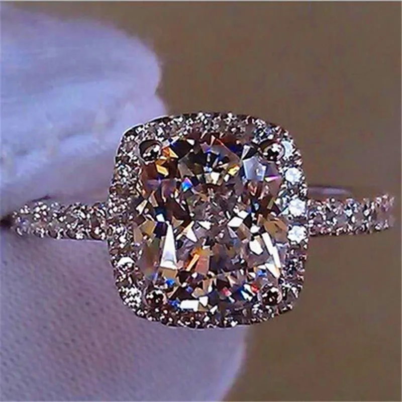 Luxury Female White Crystal Stone Ring Charm Silver Color Love Wedding Rings For Women Cute Bride Square Zircon Engagement Ring
Luxury Female White Crystal Stone Ring Charm Silver Color Love Wedding Rings For Women Cute Bride Square Zircon Engagement Ring
