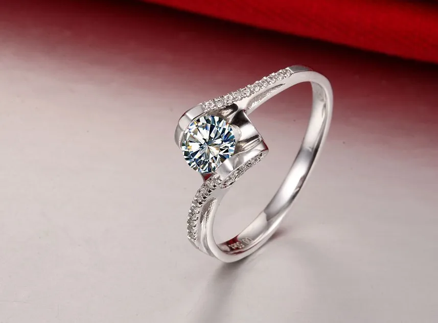 Angel Kiss Style Micro Pave 0.6CT Fine Diamond Wedding Ring Pure Silver Fine Jewelry White Gold Cover Last All Life
Angel Kiss Style Micro Pave 0.6CT Fine Diamond Wedding Ring Pure Silver Fine Jewelry White Gold Cover Last All Life